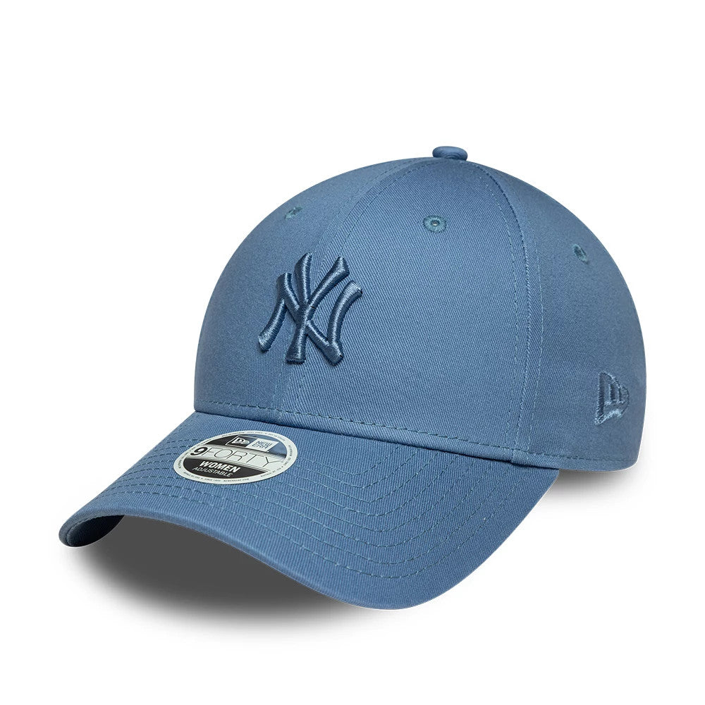 New York Yankees Womens MLB League Essential Blue New Era 9FORTY Adjustable Cap, three-quarter view showing the blue raised embroidered NY logo on the front panel, curved blue visor, and 9FORTY size sticker in place.