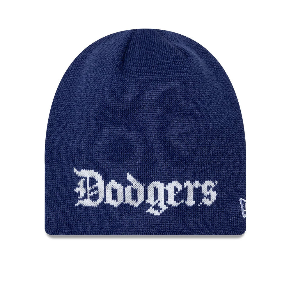New Era LA Dodgers MLB Script Dark Blue Skull Knit Beanie Hat, front view showing white Dodgers script lettering across the centre, with a finely ribbed knit texture and the New Era flag logo on the left side.