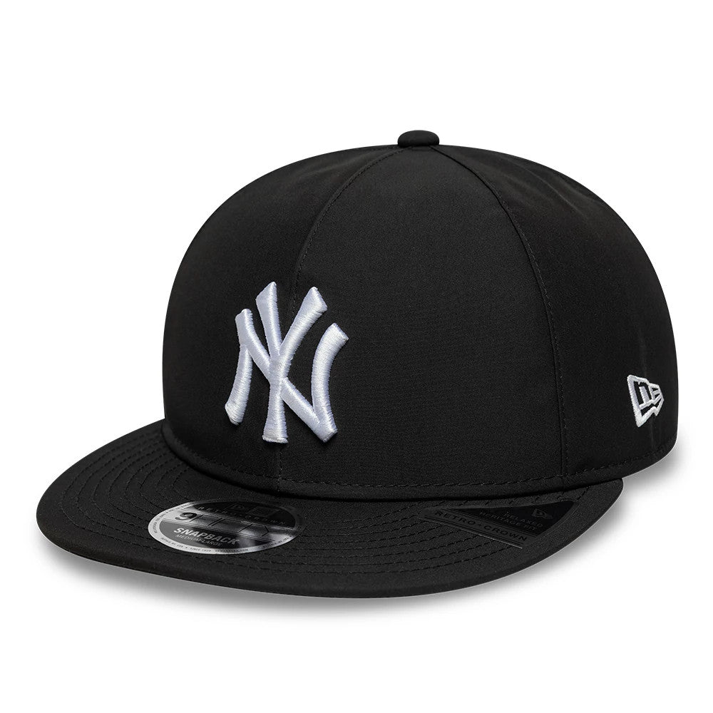 New York Yankees MLB X Gore-Tex Black Retro Crown New Era 9FIFTY Adjustable Cap, three-quarter view showing raised white NY logo embroidery on the front panel, black visor with 9FIFTY size sticker, and New Era flag logo on the left side.