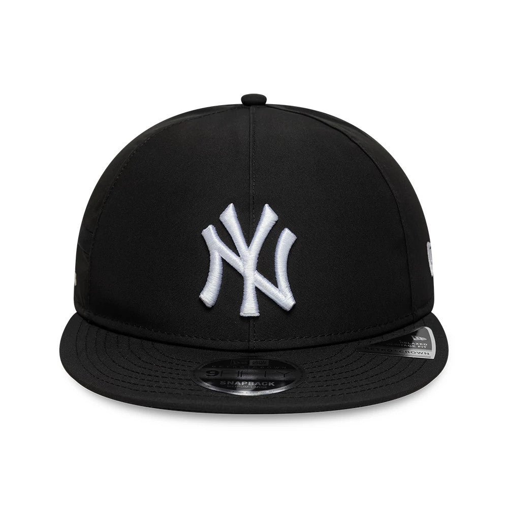 New York Yankees MLB X Gore-Tex Black Retro Crown New Era 9FIFTY Adjustable Cap, front view showing the raised white embroidered NY logo on the black crown, with a flat visor and a 9FIFTY size sticker on the centre of the visor.
