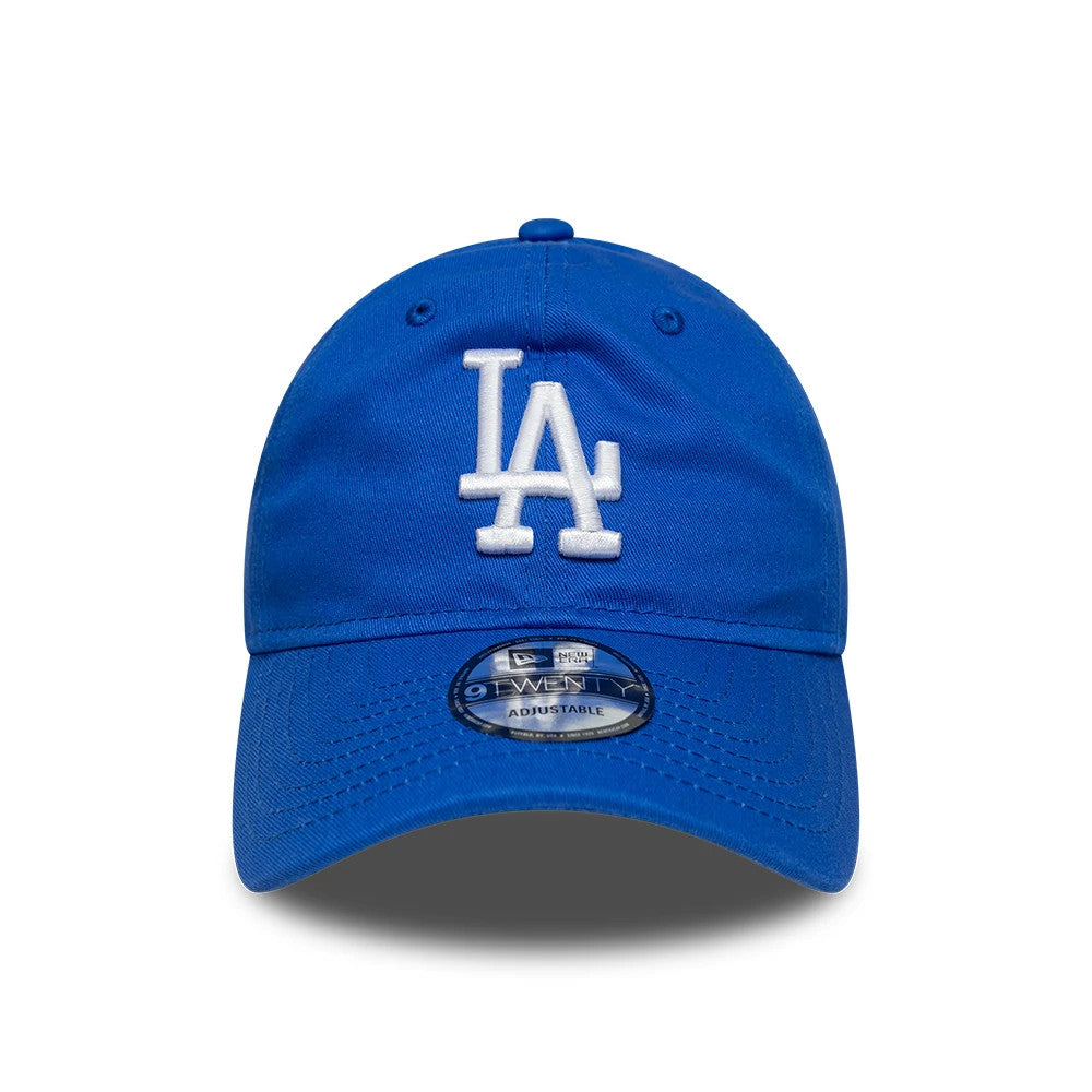 LA Dodgers MLB League Essential Bright Blue New Era 9TWENTY Adjustable Cap, front view showing the raised white embroidered LA logo on the front panel, with a bright blue curved visor and a 9TWENTY size sticker on the visor.