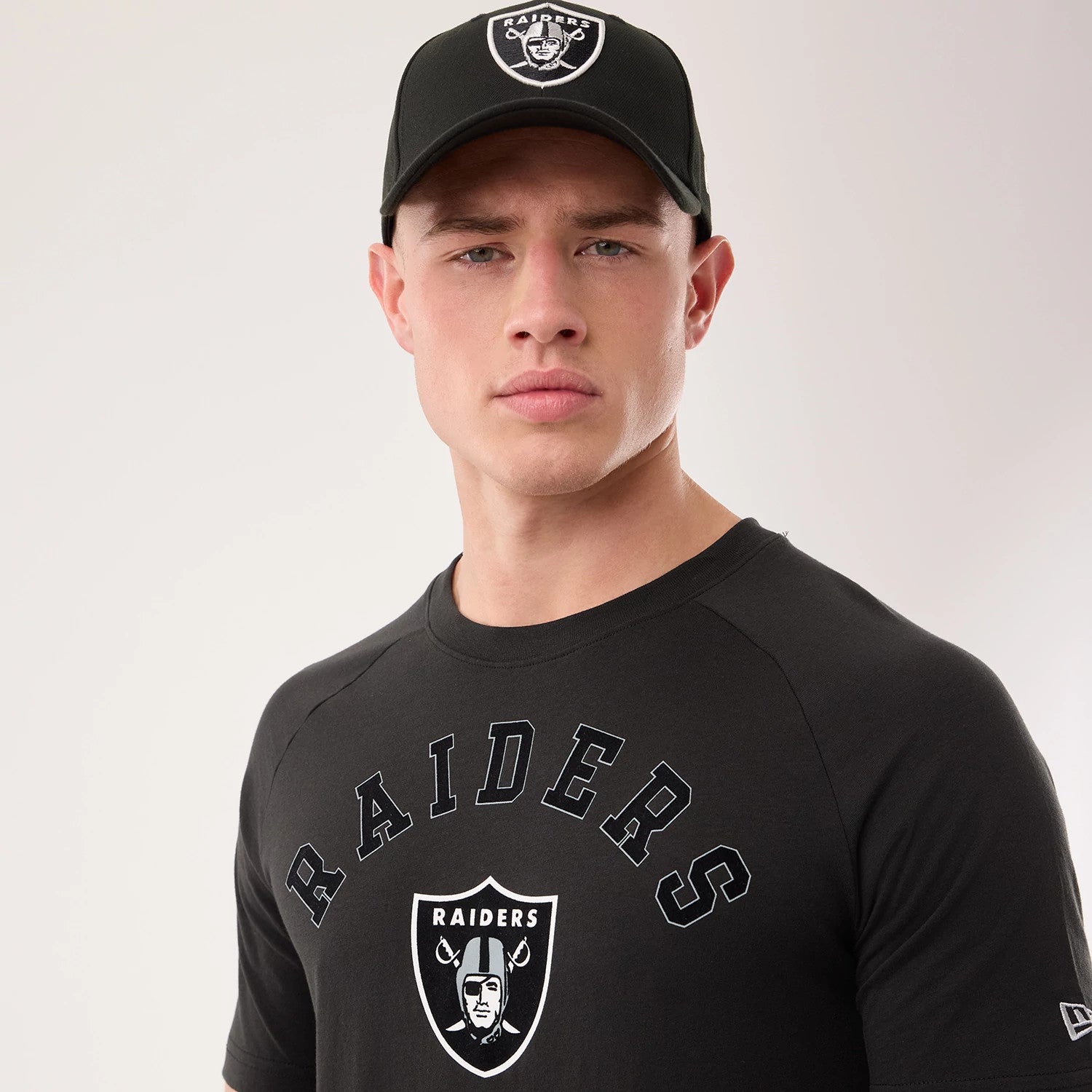 The model is wearing this NFL Sideline 2026 Las Vegas Raiders T-Shirt in black. 3