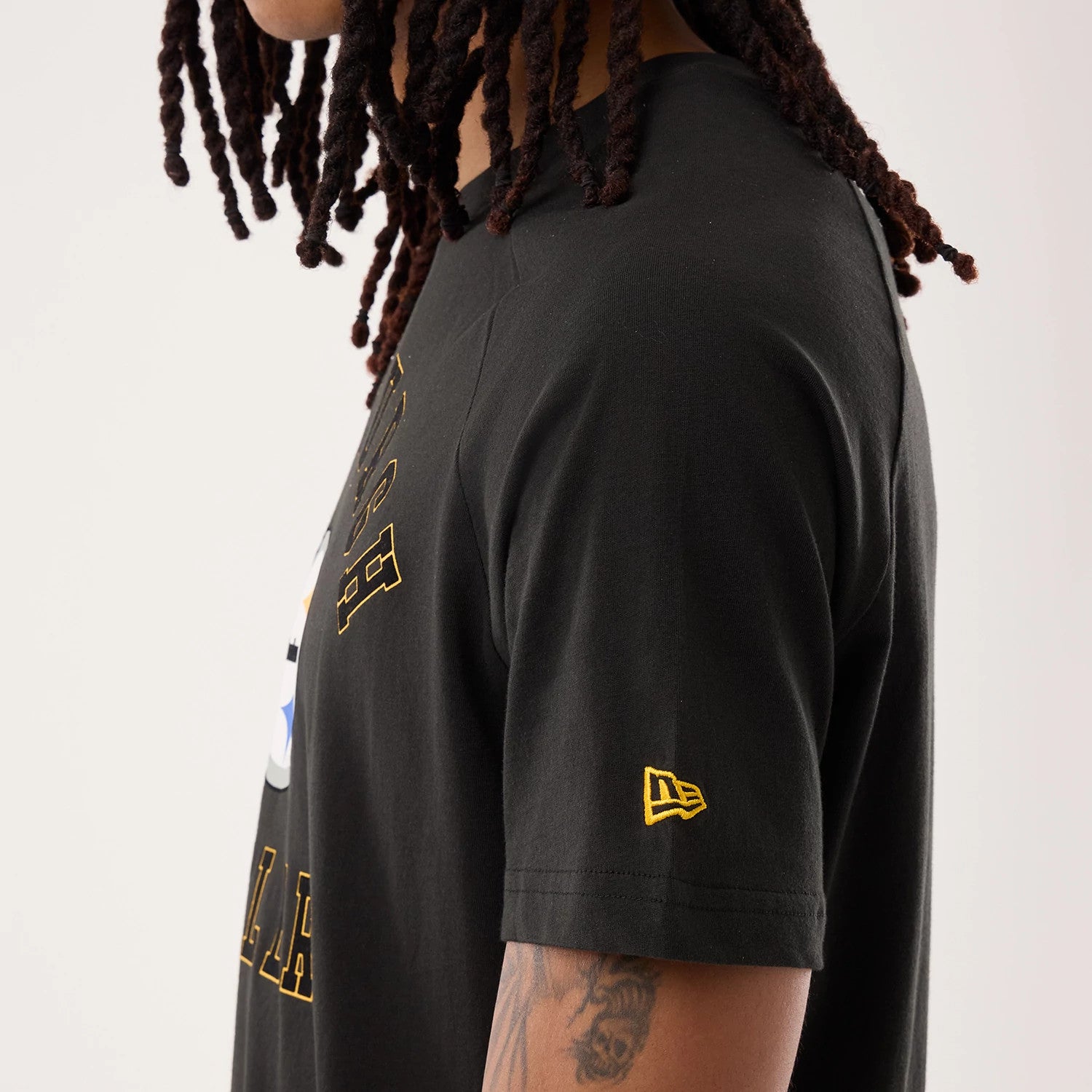 The model is wearing this NFL Sideline 2026 Pittsburgh Steelers T-Shirt in black. 3