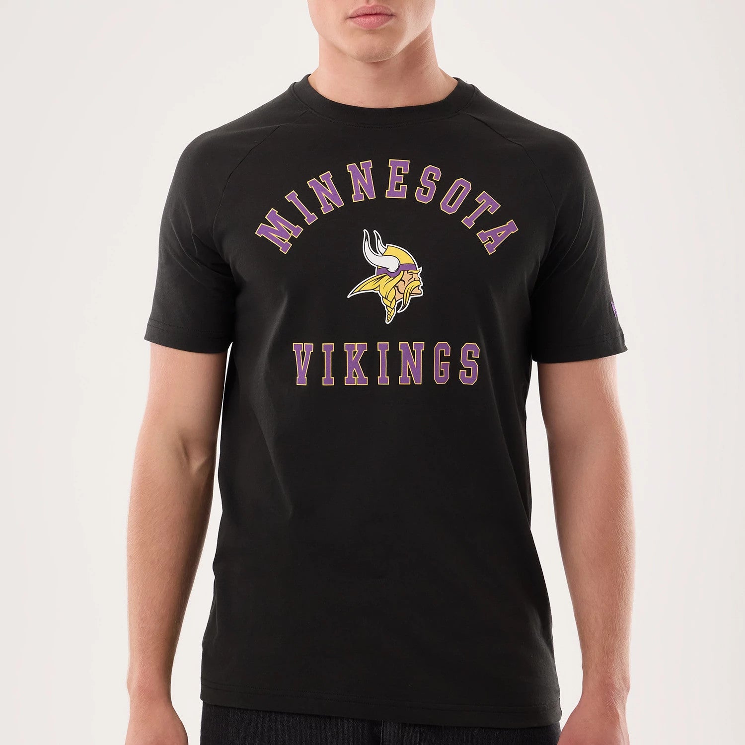 The model is wearing this NFL Sideline 2026 Minnesota Vikings T-Shirt in black. 4