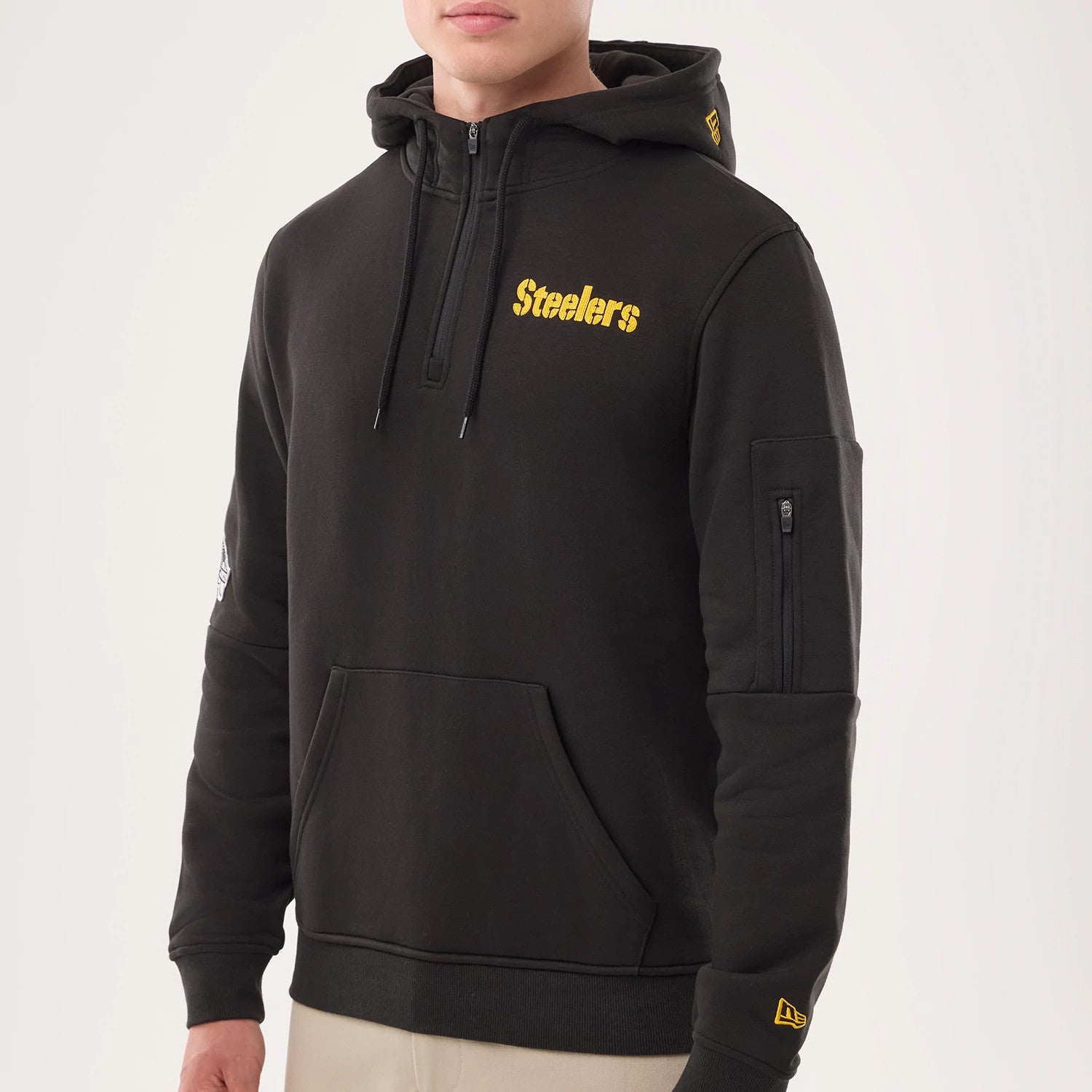 The model is wearing this NFL Sideline 2026 Pittsburgh Steelers Pullover Hoodie in black. 3