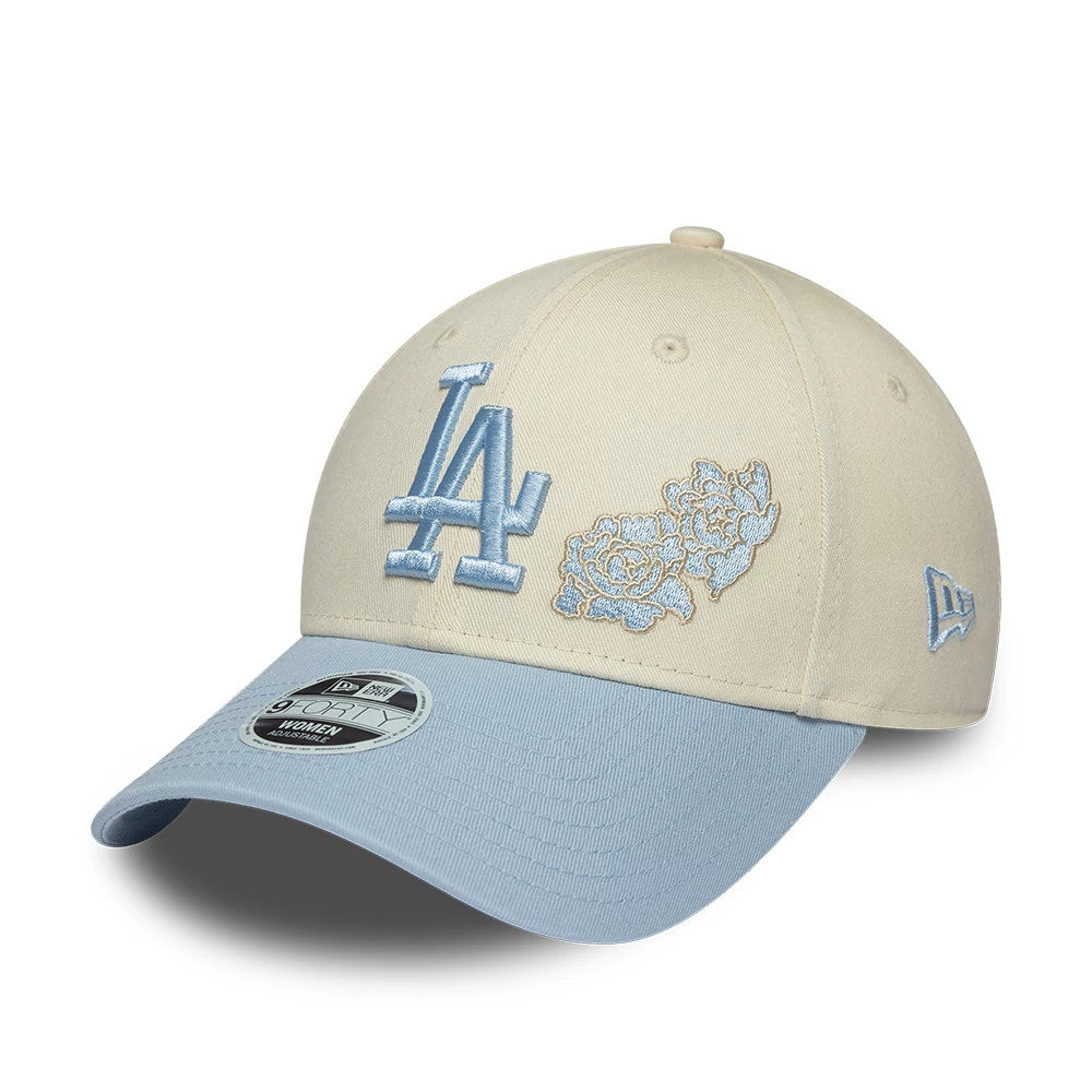 LA Dodgers Womens MLB Floral Cream New Era 9FORTY Adjustable Cap, front view showing a light blue embroidered LA logo and floral design on the cream front panels, light blue curved visor, and a New Era 9FORTY size sticker.