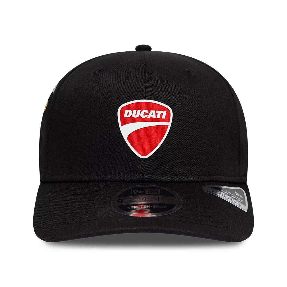 Ducati Motor Logo Patch Black New Era 9SEVENTY Stretch Snap Adjustable Cap, front view showing a large red and white Ducati logo patch on the structured black crown, with a black curved visor featuring a 9SEVENTY size sticker and logo on the side.