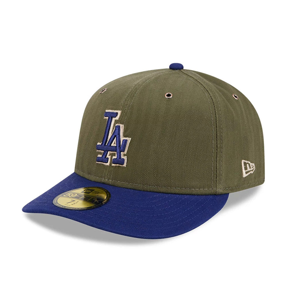 LA Dodgers MLB American Herringbone Green New Era 59FIFTY Fitted Cap, three-quarter view showing the blue LA logo in raised embroidery on the front panel, matched by a blue visor and a gold 59FIFTY size sticker on the visor.