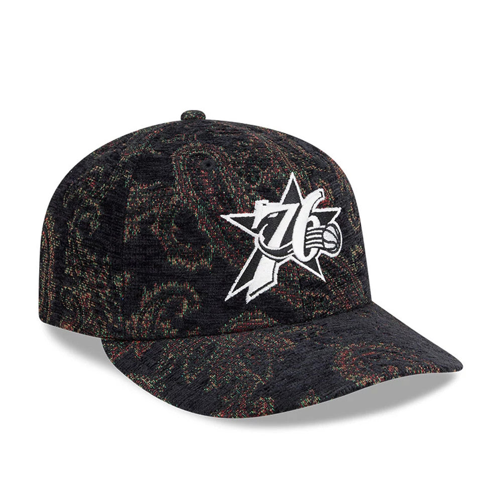 Philadelphia 76ers NBA Jacquard Chenille Black New Era 59FIFTY Fitted Cap, three-quarter view showing the white embroidered 76ers logo with star and basketball detail on the front panel.