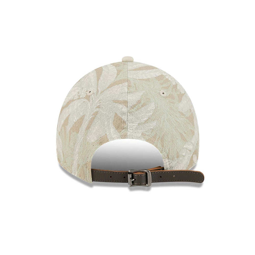 Atlanta Braves MLB Leafy Palm Light Beige New Era 9TWENTY Adjustable Cap, rear view showing an elegant palm leaf pattern across the light beige fabric, with a brown leather adjustable strap and a top button accentuating the relaxed crown design.