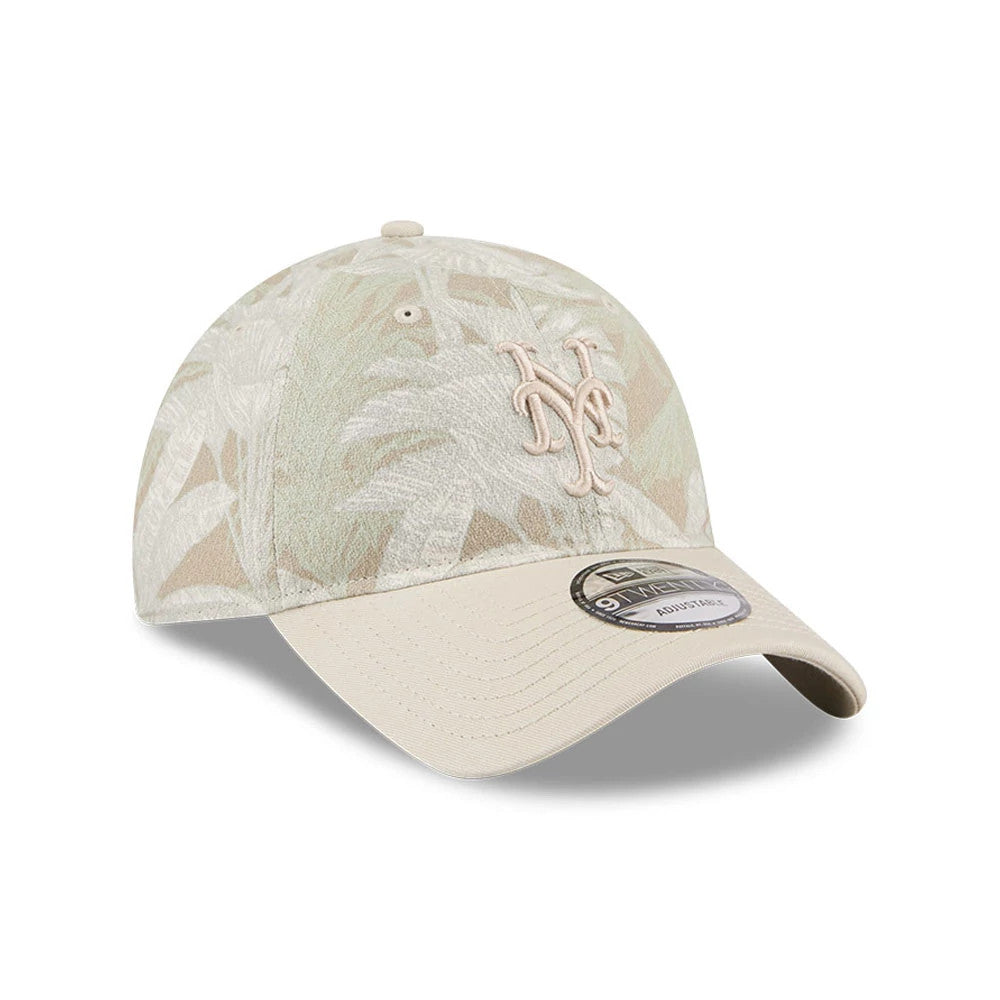 New York Mets MLB Leafy Palm Light Beige New Era 9TWENTY Adjustable Cap, three-quarter view showing the light beige NY logo embroidered on the front panel, the leafy palm pattern across the structured crown, and the 9TWENTY size sticker on the visor.