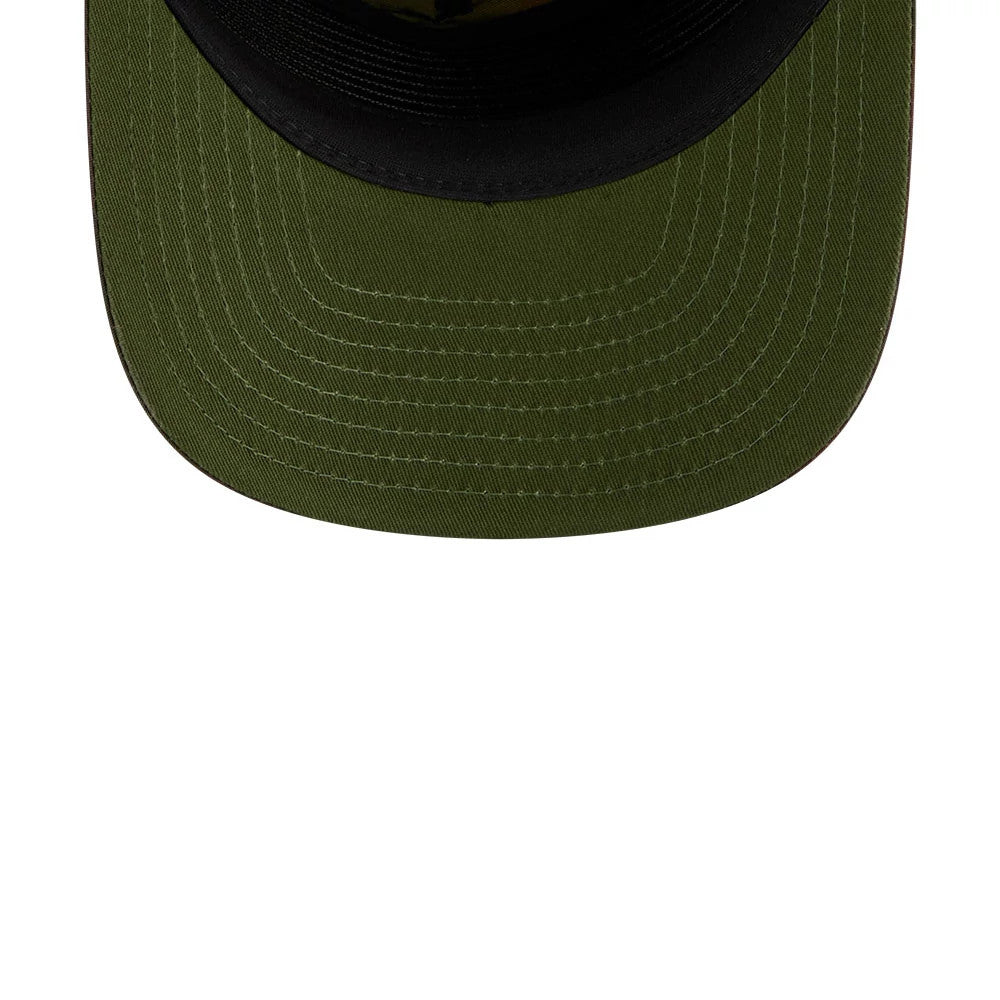 New Era Nylon Wash Dye Open Green 19TWENTY Adjustable Cap, inside view featuring dark green stitching on the visor, a black undervisor for contrast, and a glimpse of the interior taping around the structured crown.