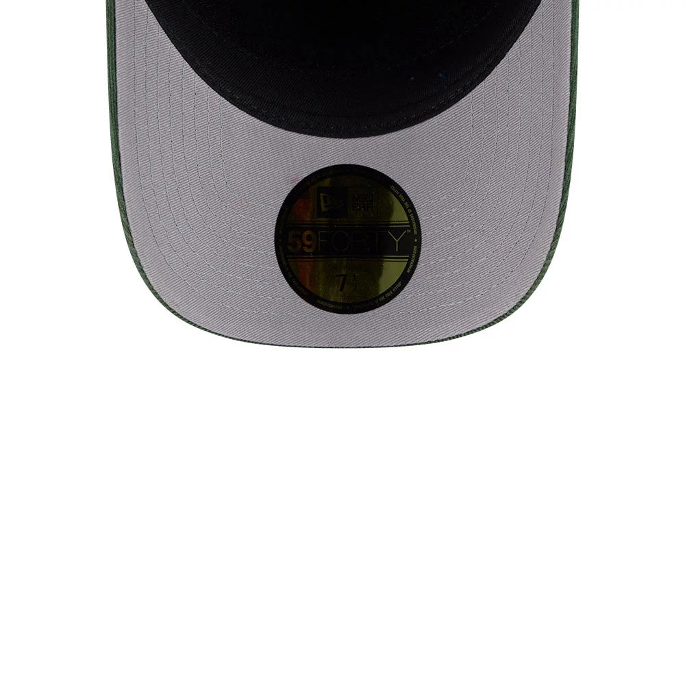 Pictured is this MLB Quickstrike Snow Wash Cord Athletics 59FORTY A-Frame Fitted cap in dark green. 2