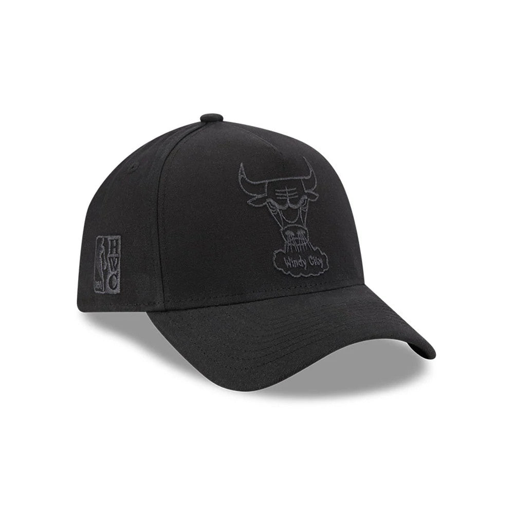 Bulls NBA Waxy Canvas Black New Era 59FORTY A-Frame Fitted Cap, three-quarter view showing the black embroidered Bulls Windy City logo on the front panel, pre-curved black visor, and HWC logo on the left side.