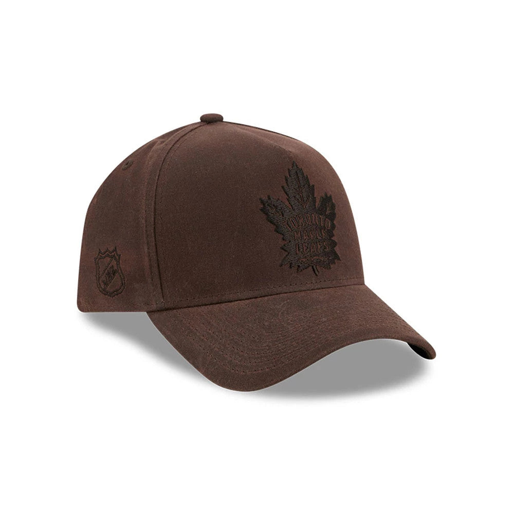 Maple Leafs NHL Waxy Canvas Open Brown New Era 59FORTY A-Frame Fitted Cap, front view showing a dark brown flat-embroidered Maple Leafs logo on the front panel, with the NHL logo embroidered on the left side and a curved brown visor.