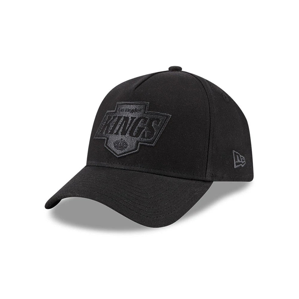 Pictured is this NHL Quickstrike Waxy Canvas LA Kings 59FORTY A-Frame Fitted cap in black. 1