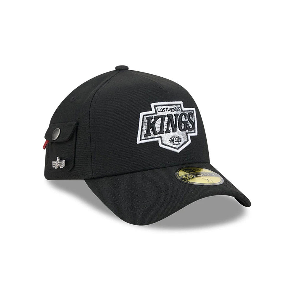 LA Kings NHL X Alpha Black New Era 59FORTY A-Frame Fitted Cap, three-quarter view showing a white and black embroidered Kings logo on the front panel, a side pocket with a silver button, and the black curved visor with a gold 59FORTY size sticker.