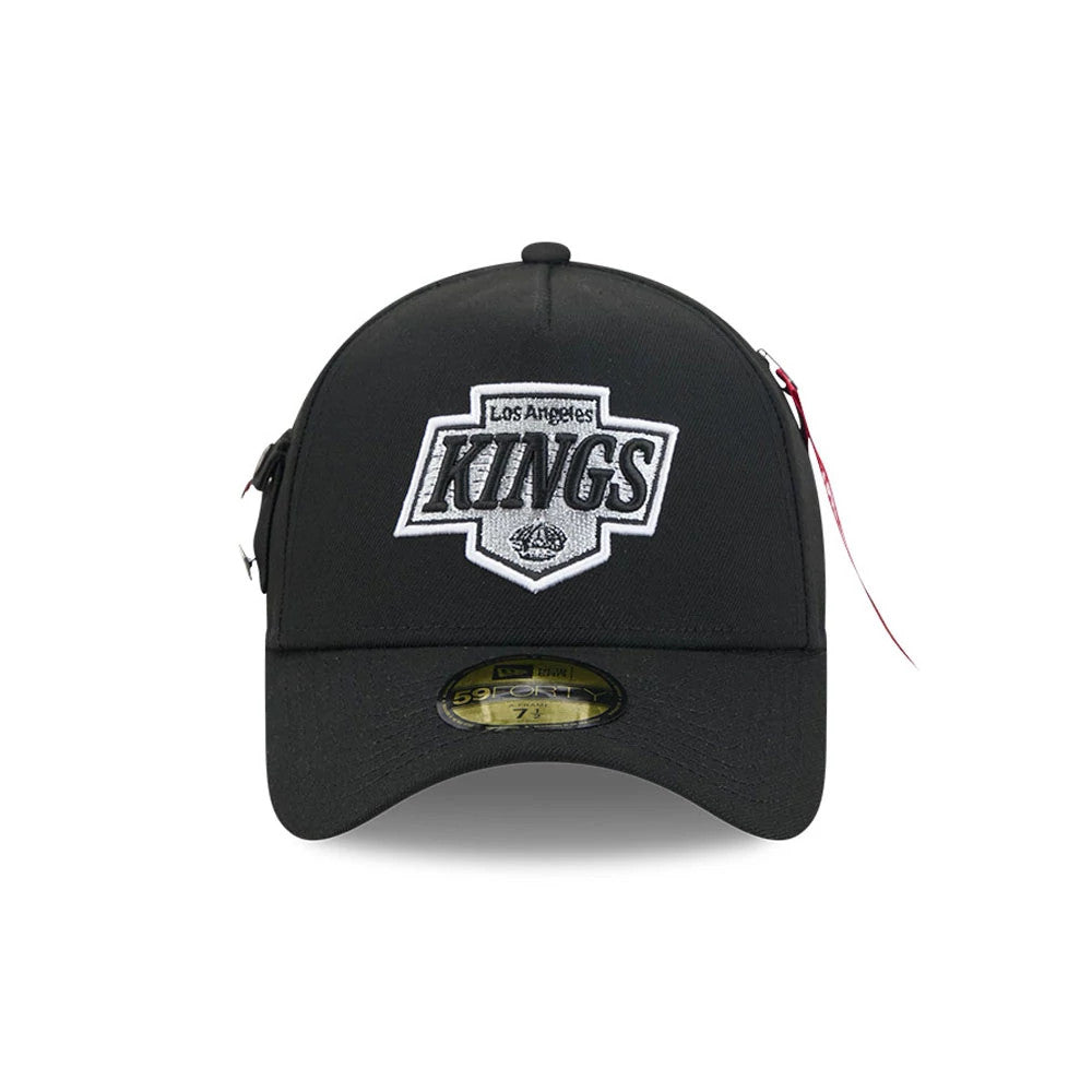 LA Kings NHL X Alpha Black New Era 59FORTY A-Frame Fitted Cap, front view showing the raised embroidered Los Angeles Kings logo in white and black on the front panel, with a curved black visor and gold 59FORTY size sticker.