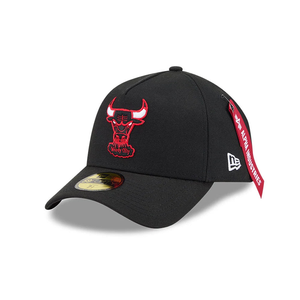 Chicago Bulls NBA X Alpha Black New Era 59FORTY A-Frame Fitted Cap, three-quarter view showing raised red and white Bulls logo embroidered on the structured black crown, a curved visor with a gold 59FORTY size sticker, and Alpha Industries tag.