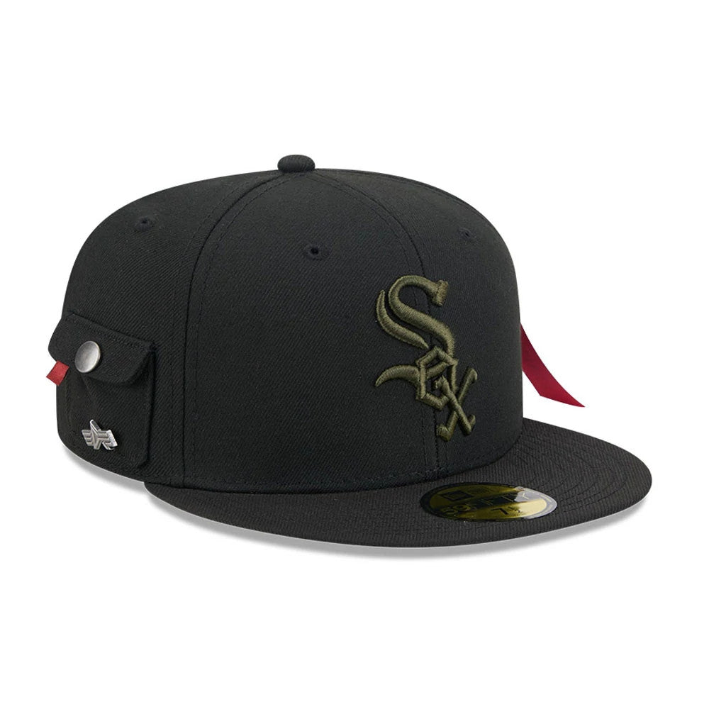 Chicago White Sox MLB X Alpha Black New Era 59FIFTY Fitted Cap, three-quarter view showing the olive embroidered Sox logo on the front panel, a small side pocket with button on the left side, and a gold 59FIFTY size sticker on the visor.