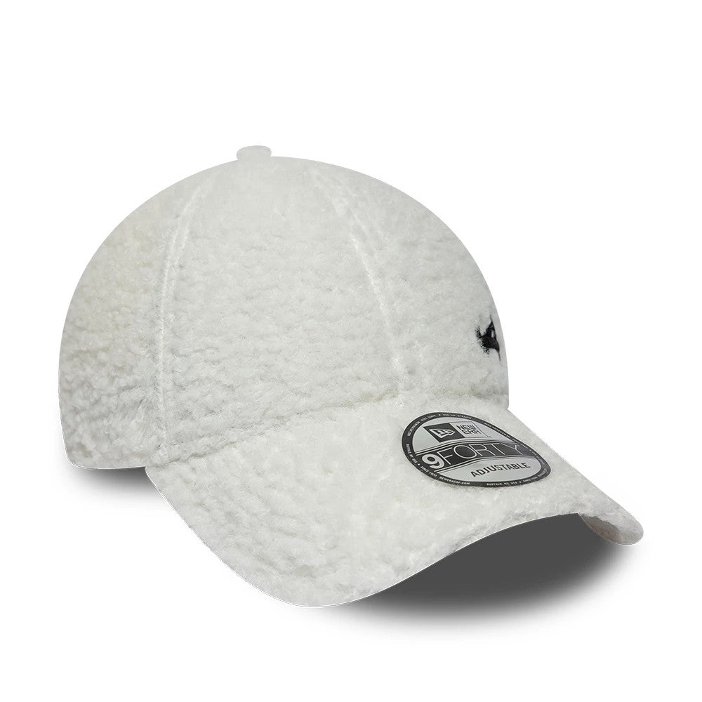 Alpine Racing A390 Cream New Era 9FORTY Adjustable Cap, three-quarter view showing a textured cream fabric with a structured crown, black Alpine logo embroidered on the side, and a black-edged 9FORTY size sticker on the curved visor.