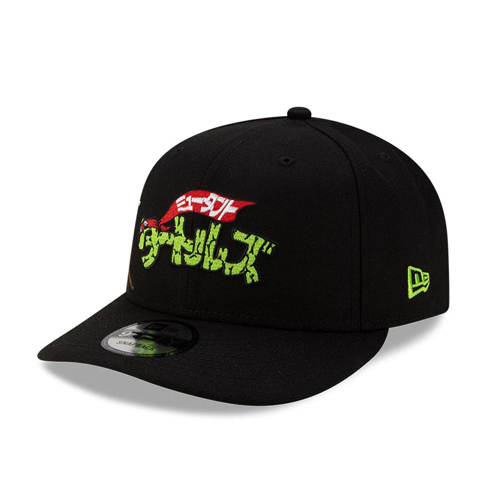 Teenage Mutant Ninja Turtles Script Black New Era 9FIFTY Snapback Adjustable Cap, three-quarter view showing a green embroidered script on the front panel, red flag design above it, with a black flat visor.