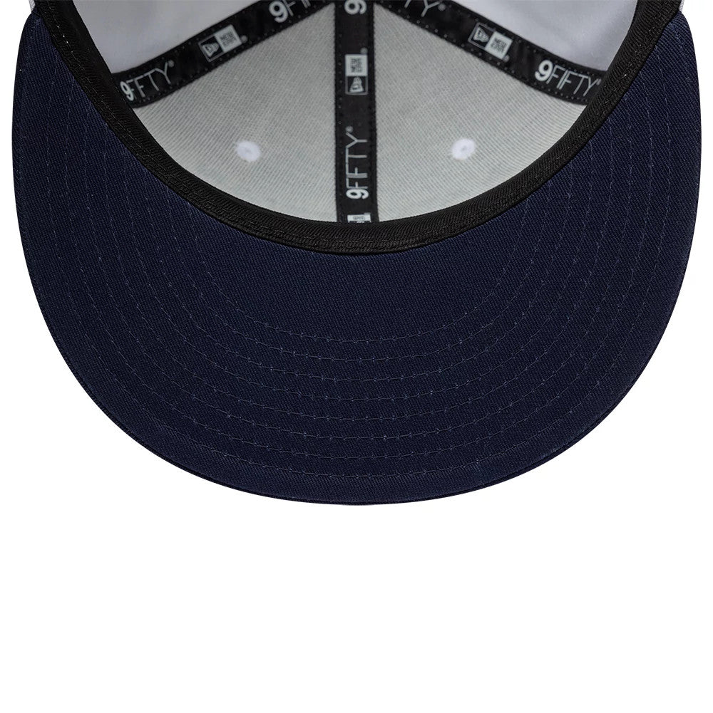 Williams Essential White New Era 9FIFTY Snapback Adjustable Cap, inside view showing grey undervisor with black taping featuring 9FIFTY branding, a black sweatband and six white sewn eyelets through the inner panels.