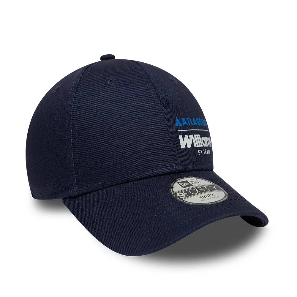 Youth Williams Essential Navy New Era 9FORTY Adjustable Cap, front view showing the white and blue Williams F1 Team embroidered logo on the structured navy crown, with a curved visor and a 9FORTY size sticker on top.