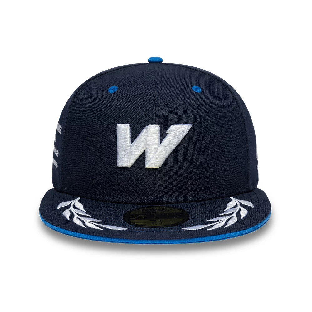 Williams Launch Navy New Era 59FIFTY Fitted Cap, front view showing the white embroidered W logo on the structured navy crown, with white laurel embroidery on the visor and a gold 59FIFTY size sticker on the dark visor.