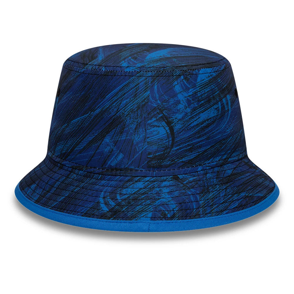 New Era Williams Team Navy Bucket Hat, three-quarter view showing the intricate blue and black abstract pattern across the entire hat, with a flexible structured crown and a downward sloping visor, featuring a and seamless design.
