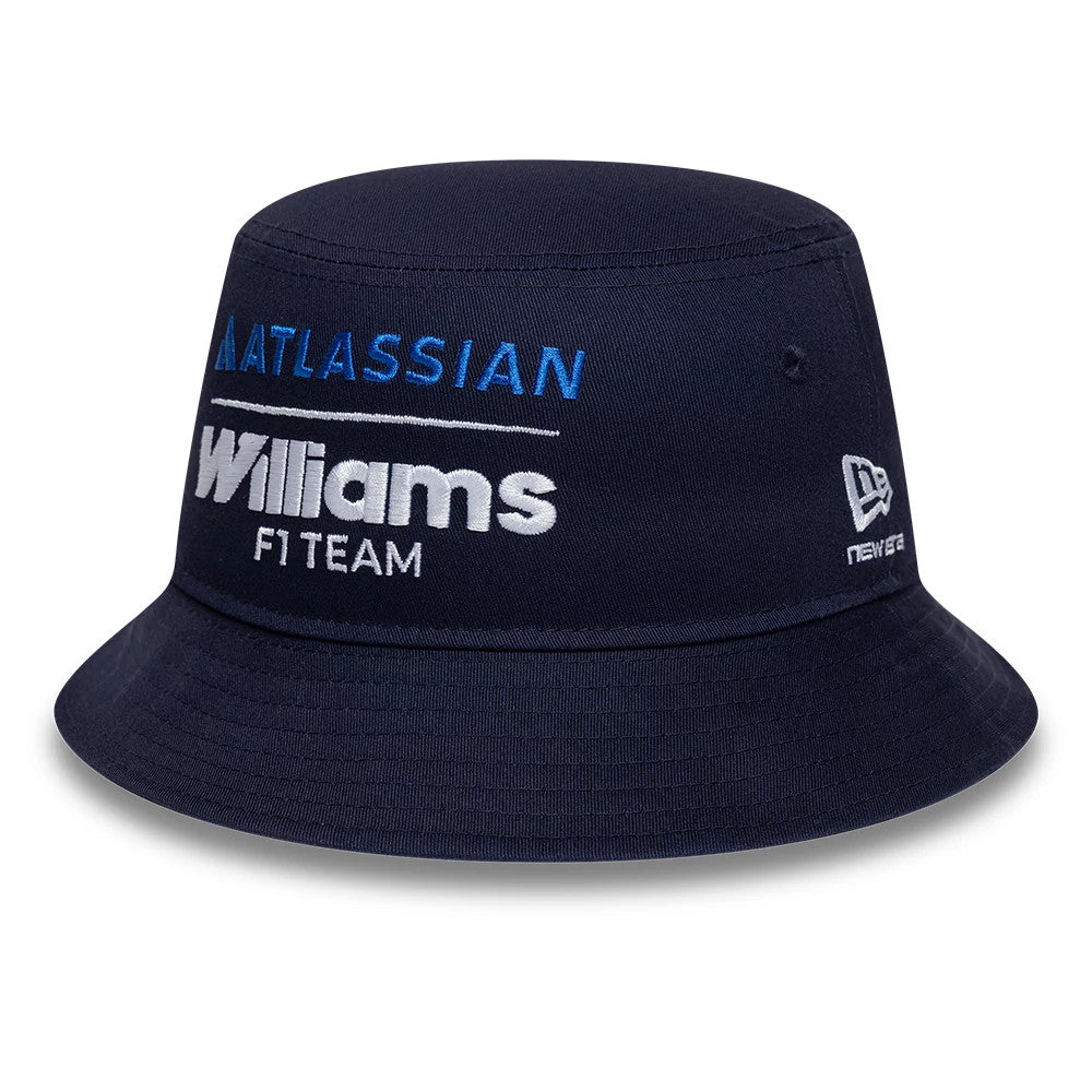 New Era Williams Essential Navy Bucket Hat, front view showing blue Atlassian embroidery and large white Williams F1 Team lettering on the crown, with the New Era flag logo in white on the left side.