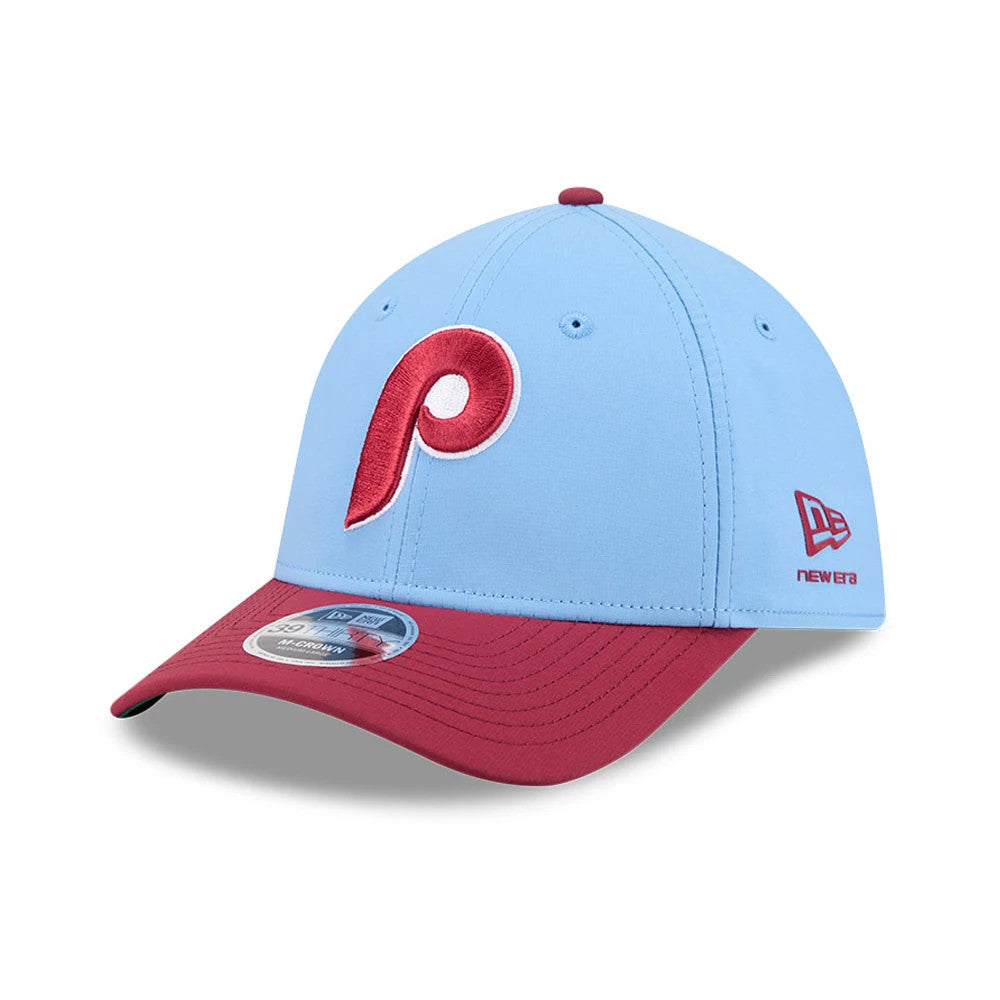 Phillies MLB All Star Game Pastel Blue New Era 39THIRTY M-Crown Stretch Fit Cap, three-quarter view showing the raised red Phillies logo embroidered on the front panels, set above a red curved visor with a 39THIRTY size sticker.