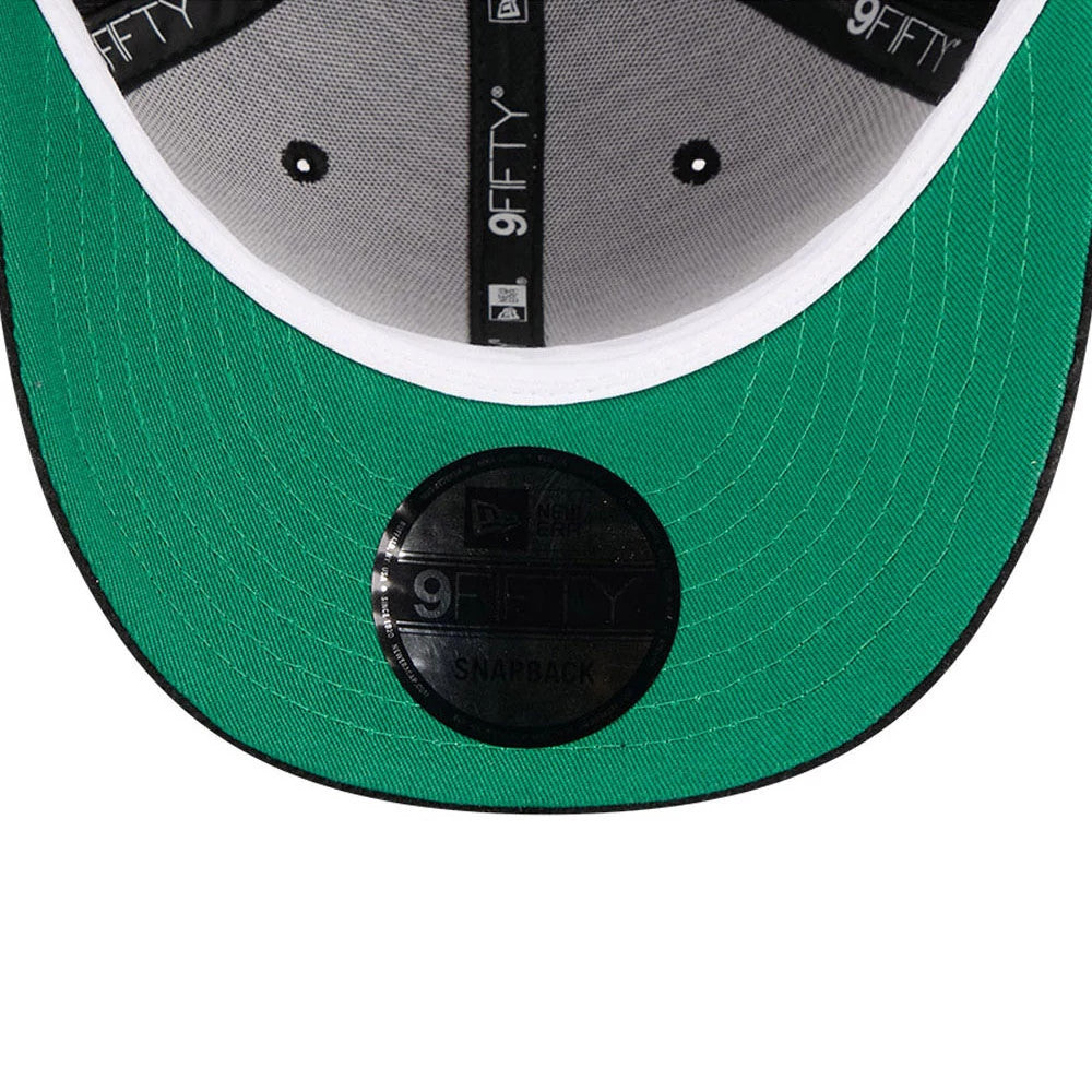 Eagles NFL 2 Tone Cord Black New Era 9FIFTY Snapback Adjustable Cap, inside view with black taping on grey fabric, a white sweatband, and a green undervisor featuring a glossy black 9FIFTY size sticker at the centre near the edge.