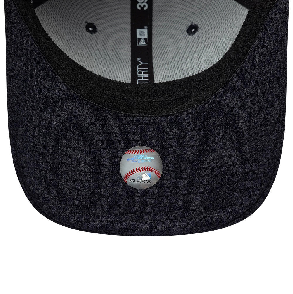 New York Yankees MLB Tech Navy New Era 39THIRTY Stretch Fit Cap, inside view showing the black sweatband and grey undervisor with black taping featuring the 39THIRTY branding, alongside a baseball-shaped sticker on the visor.