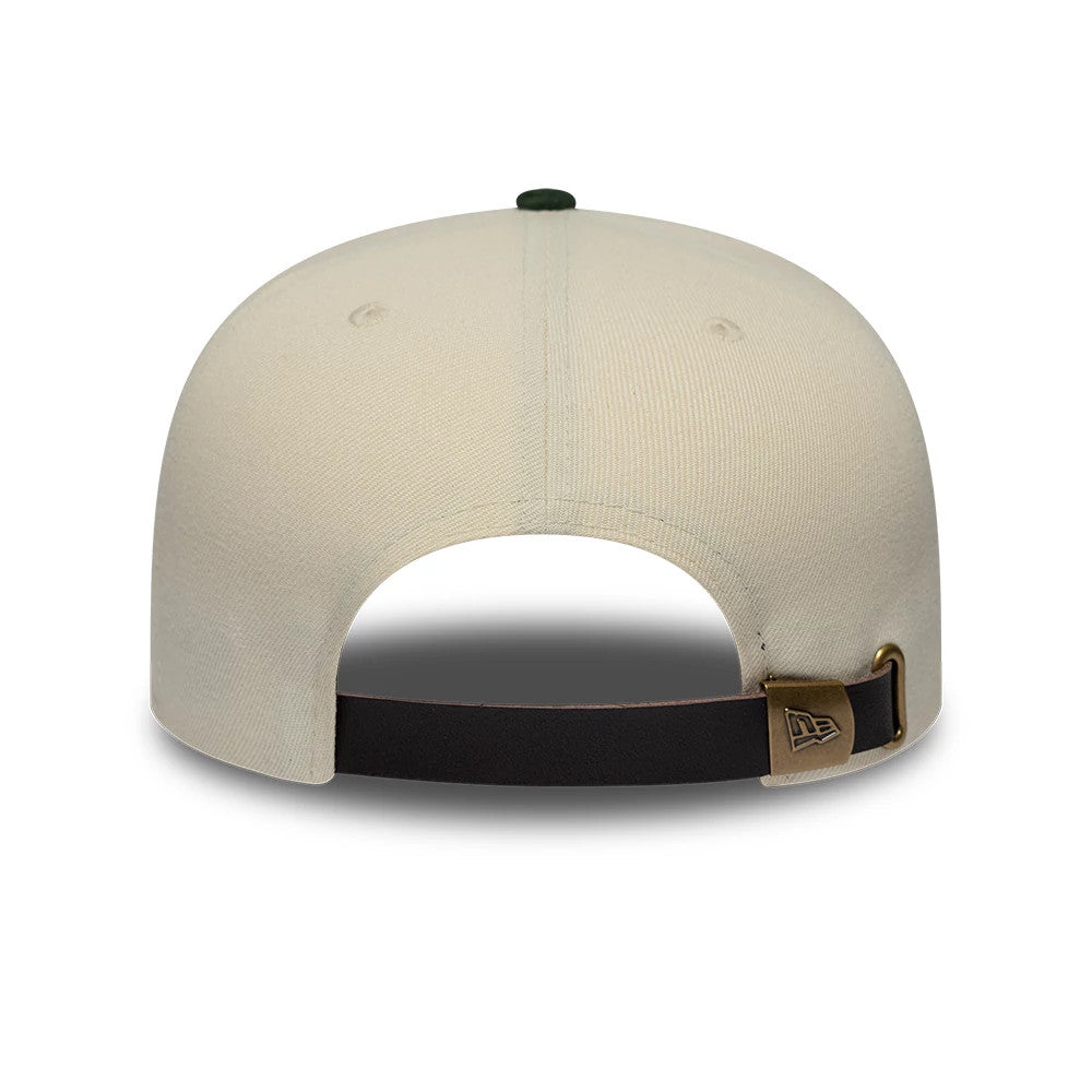 New York Yankees MLB Suede Visor Cream New Era 9FIFTY A-Frame Adjustable Cap, rear view showing the adjustable brown strap with a gold New Era clasp, the cream-coloured structured crown with eyelets, and a dark top button.