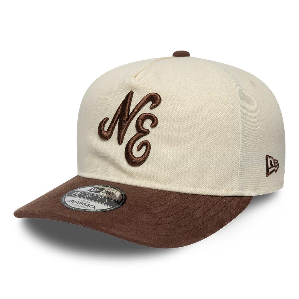 New Era Suede Visor Cream 9FIFTY A-Frame Adjustable Cap, front view showing brown raised embroidered NE logo on the cream crown, paired with a brown suede visor and a 9FIFTY size sticker, with the New Era flag logo on the left side.