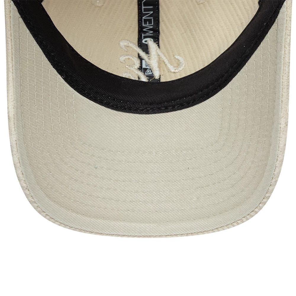 Pictured is this New Era Washed Cord 9TWENTY cap in Cream. 7