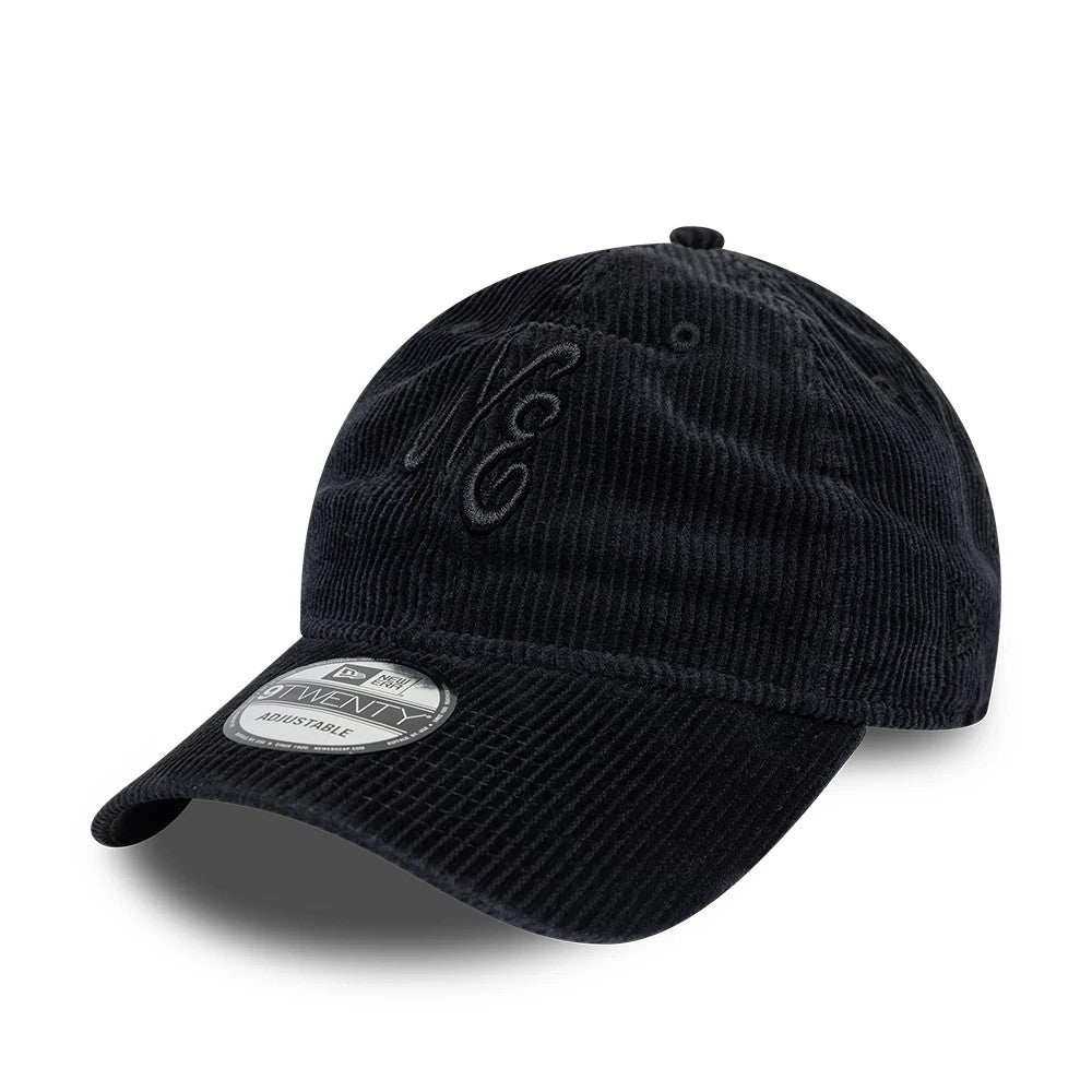 New Era Washed Cord Black New Era 9TWENTY Adjustable Cap, three-quarter view showing a embroidered NE logo on the front panel, curved black visor with a 9TWENTY size sticker, and soft washed corduroy material.