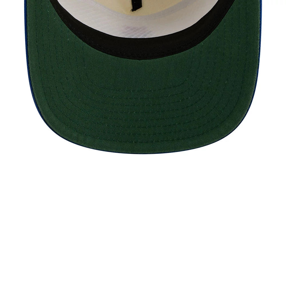 New Era Tulip Cream 19TWENTY Adjustable Cap, inside view showing the green undervisor, black inner sweatband, and cream taping, highlighting the structure and finish from an overhead perspective.