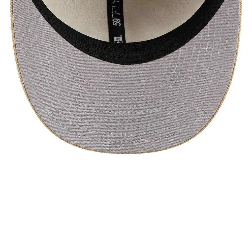 New Era Herringbone Beige Retro Crown 59FIFTY Fitted Cap, inside view showing a grey undervisor with beige stitching, a black inner sweatband, and the New Era 59FIFTY label alongside a white MLB Batterman logo on the taping.