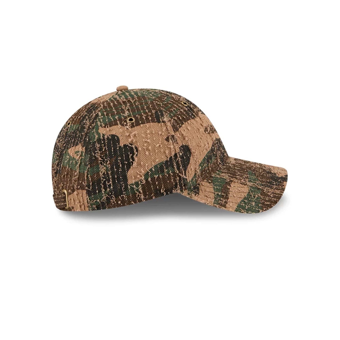 New Era Camo Casual Classic Adjustable Cap, side view showing the camouflage pattern in shades of brown, green, and beige, with a curved visor and an embroidered top button, featuring eyelets on a softly structured crown.