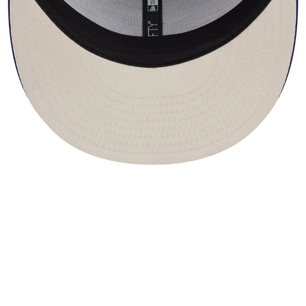Pictured is this Top Gun 9FIFTY Trucker cap in dark blue. 2
