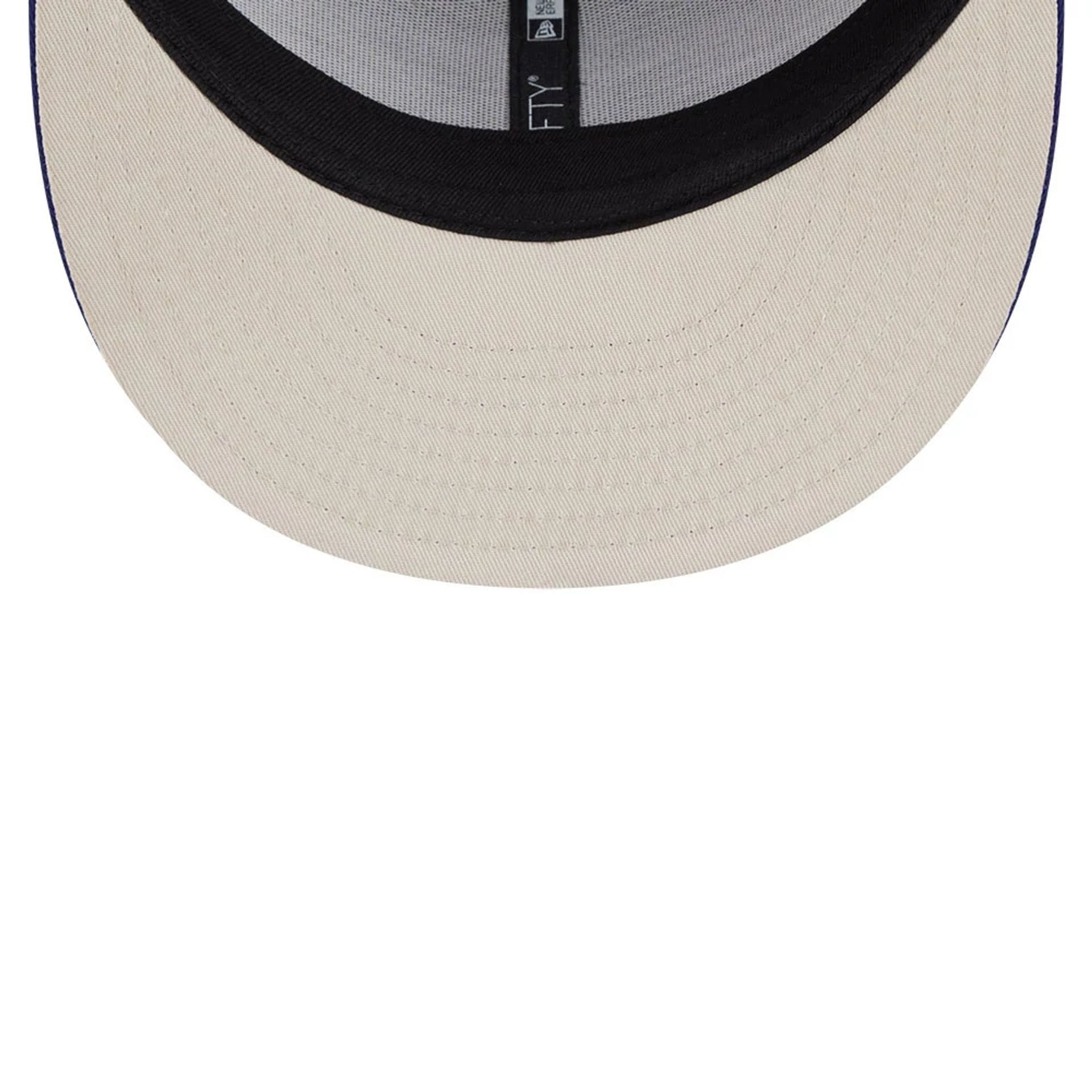 Pictured is this Top Gun 9FIFTY Trucker cap in dark blue. 2