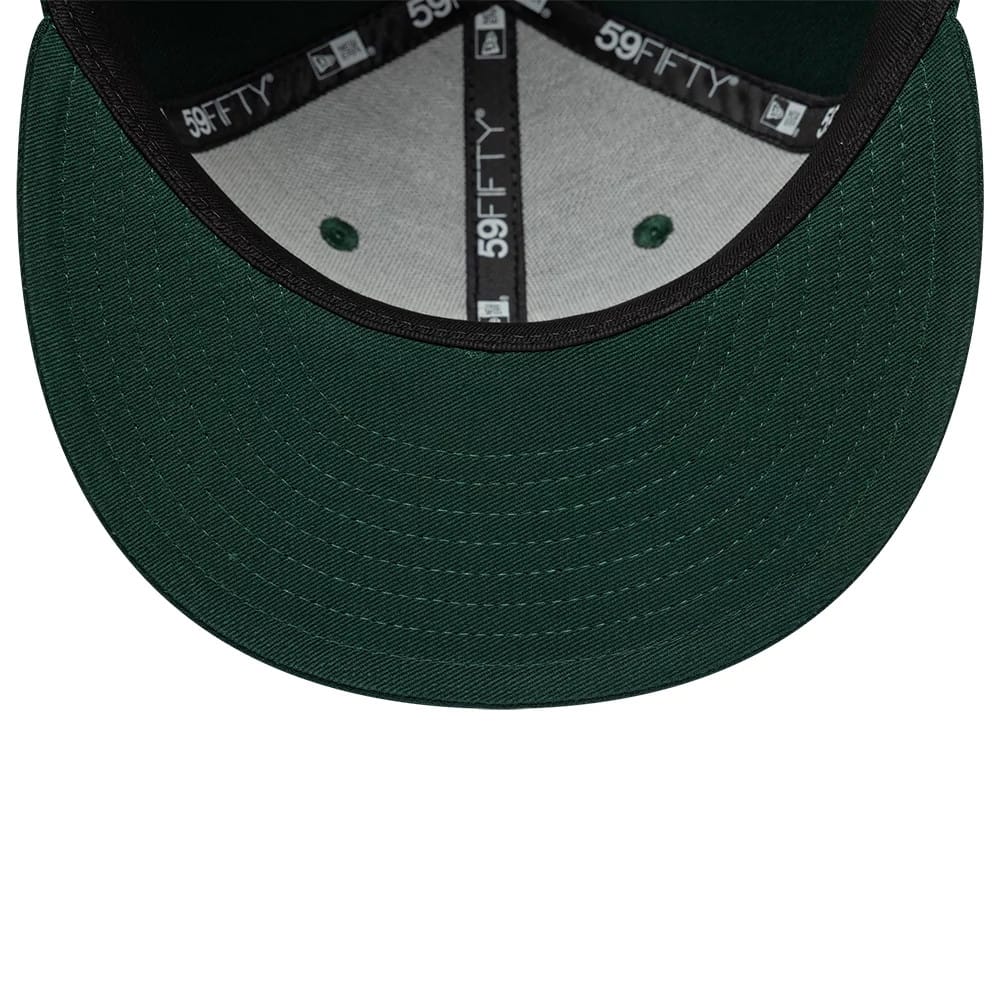 Pictured is this MLB League Essential New York Yankees 59FIFTY Fitted cap in dark green. 5