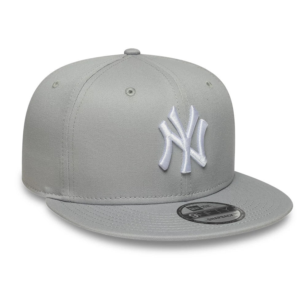 Pictured is this MLB League Essential New York Yankees 9FIFTY Snapback Adjustable cap in light grey. 3