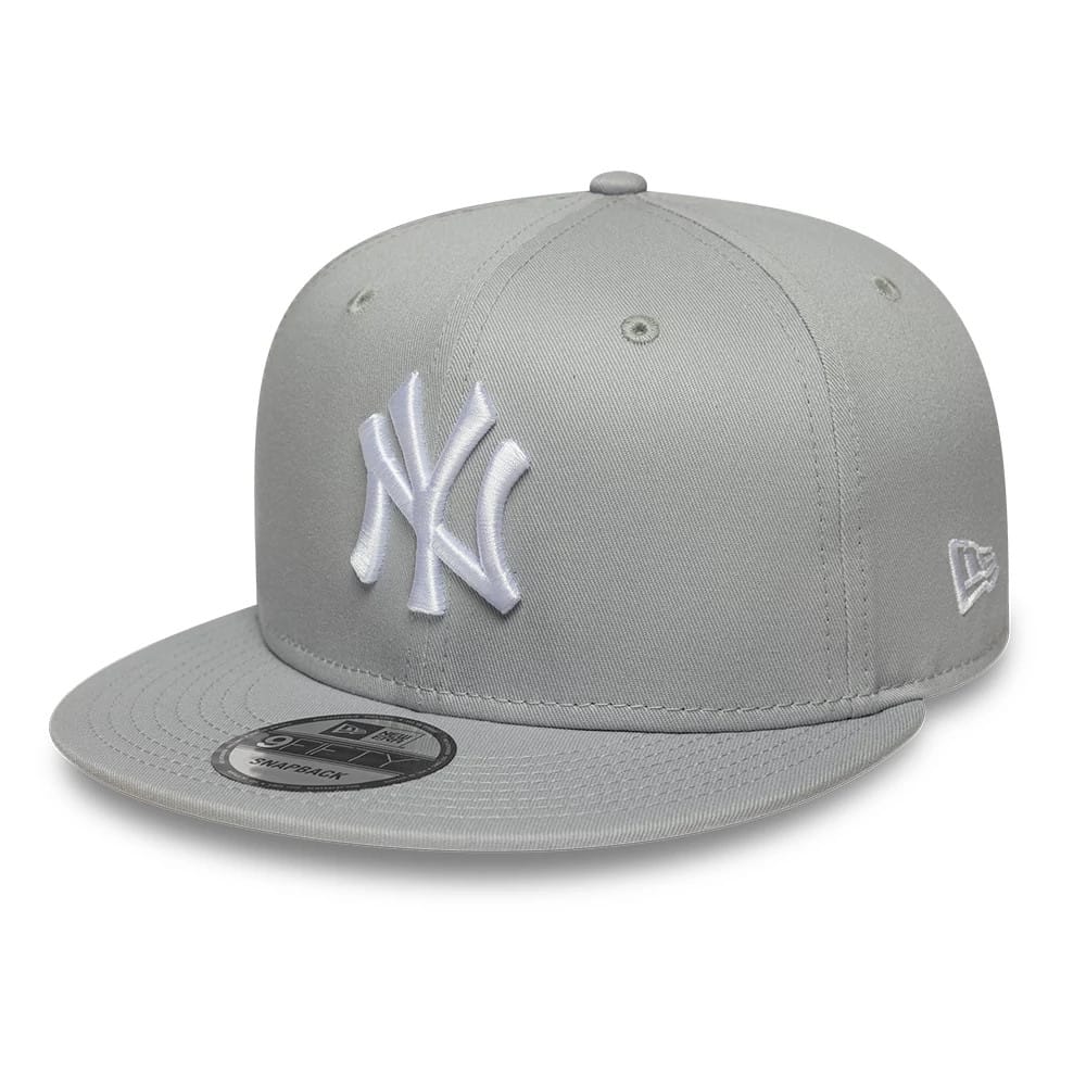 Pictured is this MLB League Essential New York Yankees 9FIFTY Snapback Adjustable cap in light grey. 1
