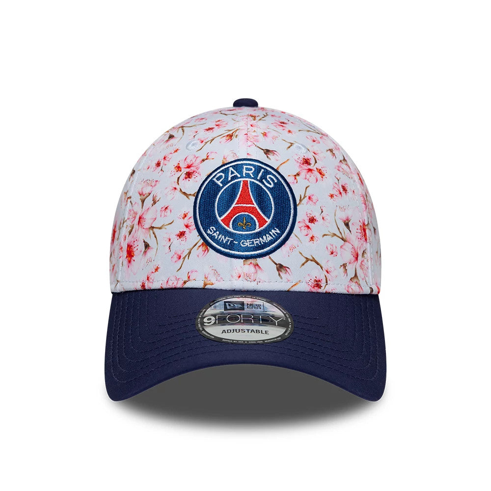 Paris Saint-Germain Cherry Blossom Navy New Era 9FORTY Adjustable Cap, front view showing the embroidered Paris Saint-Germain logo on the floral-patterned crown, navy curved visor and the 9FORTY size sticker centrally positioned on the visor.