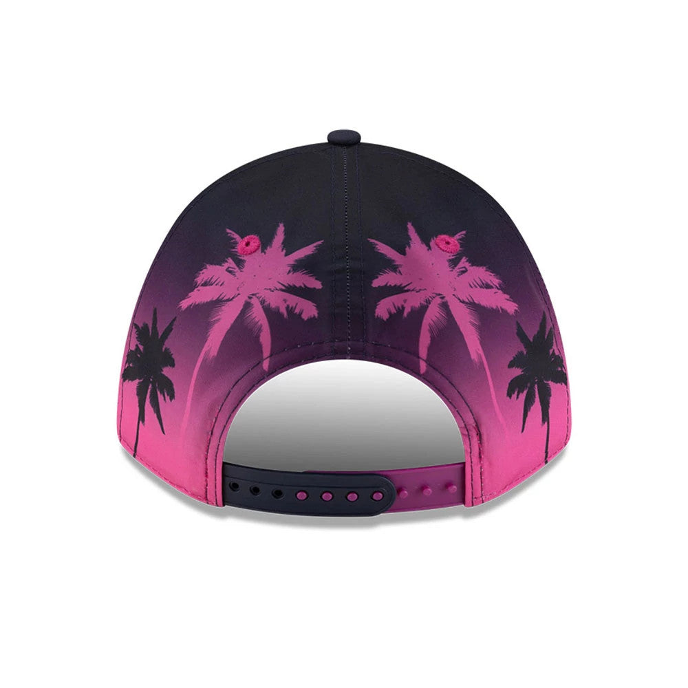 Williams Carlos Sainz Miami Navy New Era 9FORTY M-Crown A-Frame Adjustable Cap, rear view showing pink and black palm tree graphics across the back panels, a black top button, and a black and pink adjustable strap.