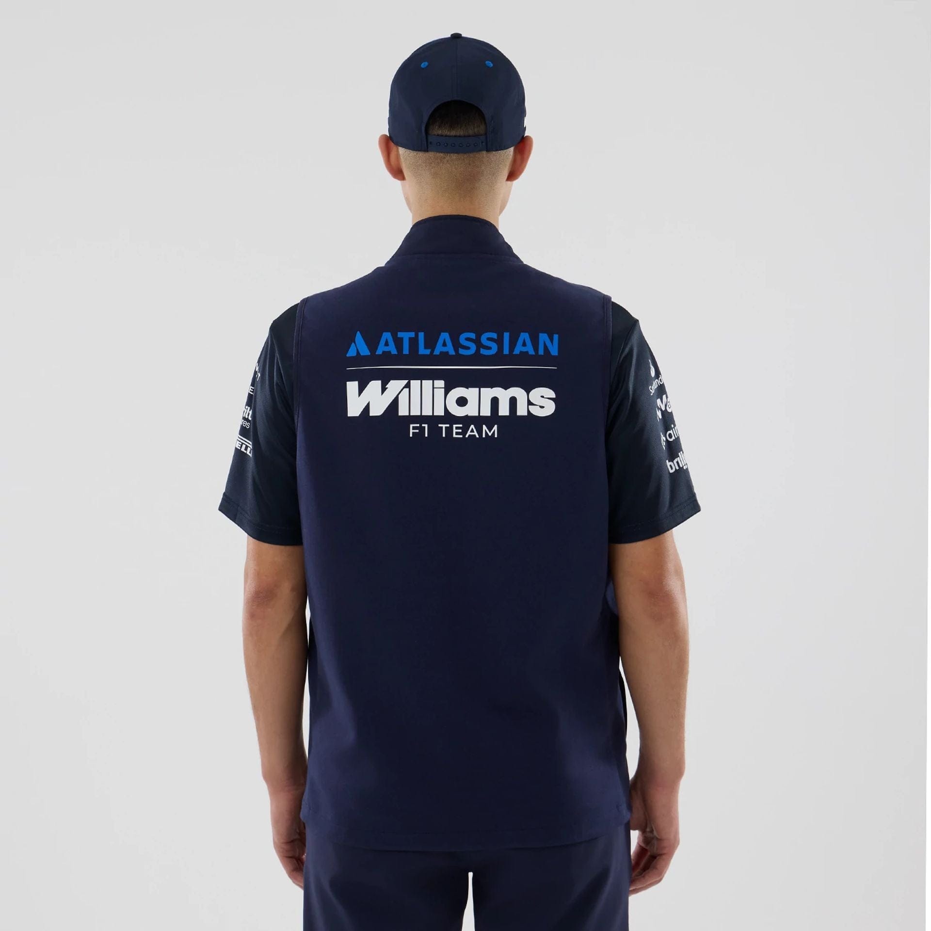The model is wearing this Atlassian Williams F1 Team Gilet in navy. 2