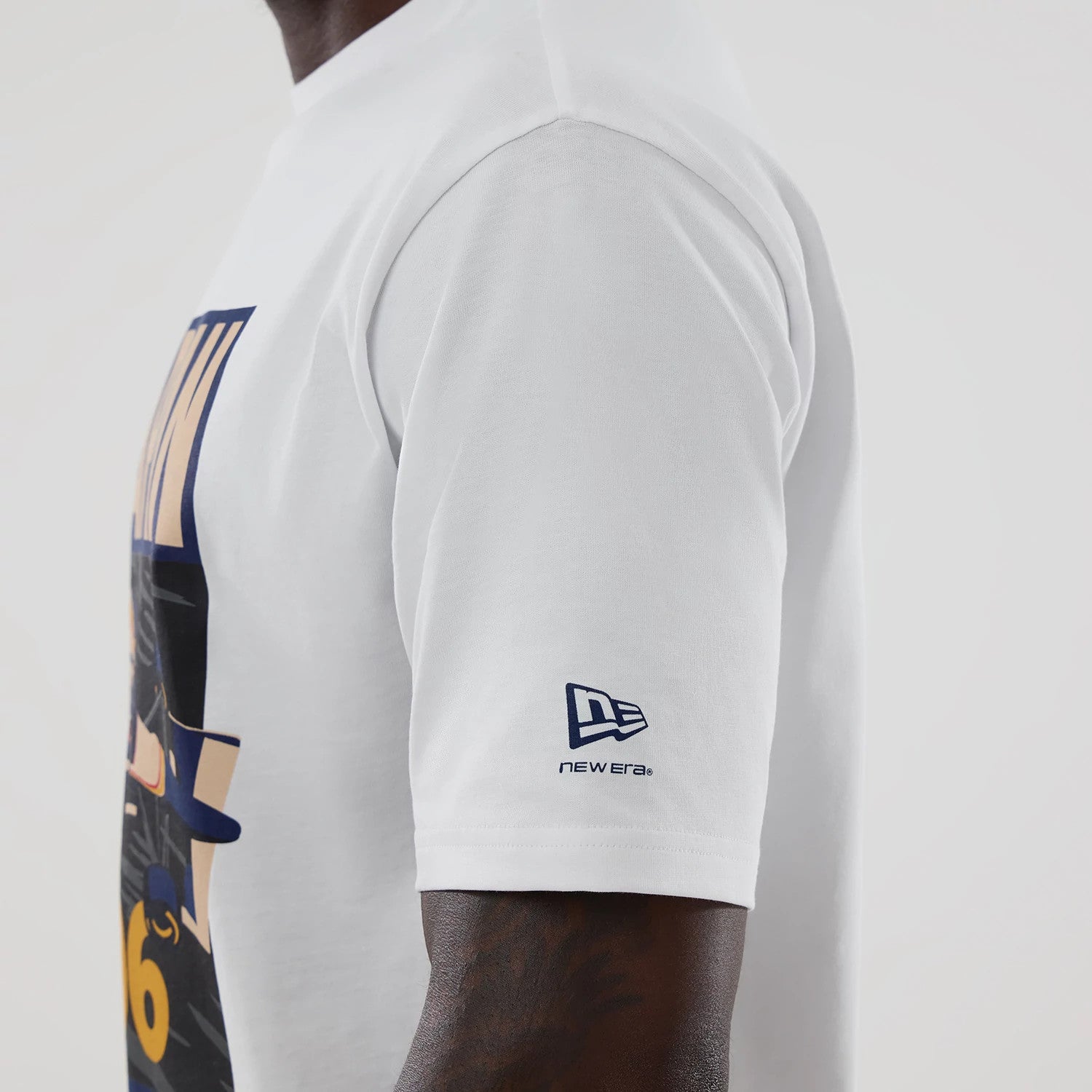 The model is wearing this Atlassian Williams F1 Team Japan 1996 World Champions Oversized T-Shirt in white. 4